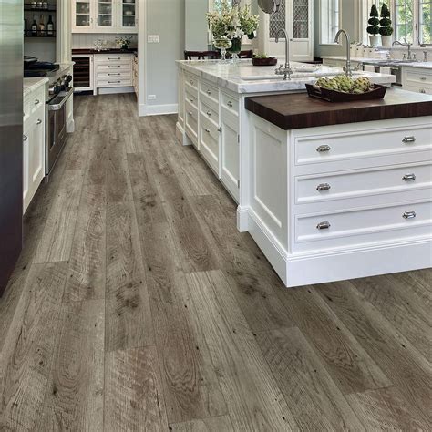 With its mixture of light and dark gray shades, this floor will give your space an elegant, sophisticated look. . Flooring at sams